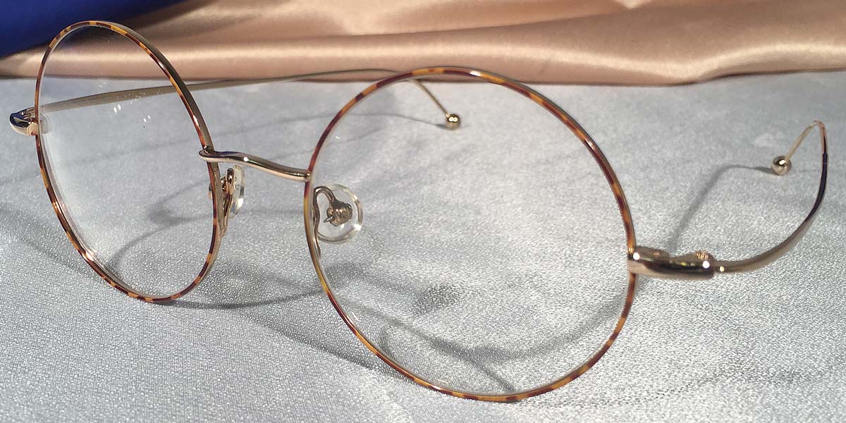 Side view of Signature Metal Rounds gold and tortoiseshell eyeglasses