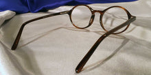 Load image into Gallery viewer, Back view of Atticus gold amber tortoiseshell eyeglasses
