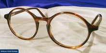 Load image into Gallery viewer, Front view of Atticus gold amber tortoiseshell eyeglasses
