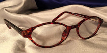 Load image into Gallery viewer, Side view of Bacchus cat-eye eyeglasses
