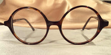 Load image into Gallery viewer, Front view of Bicycles round tortoise shell eyeglasses
