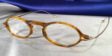 Load image into Gallery viewer, Side view of Capistranos tortoise shell and gold oval eyeglasses
