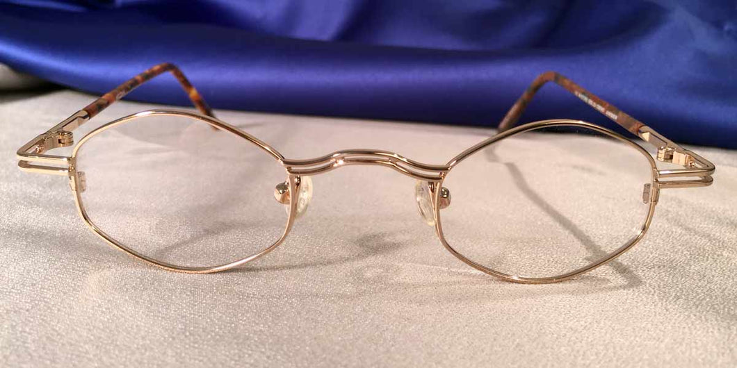 Front view of Duo-Bar Lunettes angled oval gold metal eyeglasses