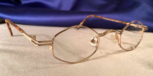 Load image into Gallery viewer, Corner view of Duo-Bar Lunettes angled oval gold metal eyeglasses
