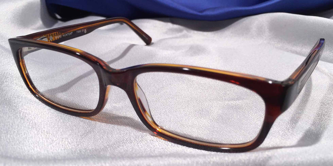 Front view of Persuaders amber brown rectangular eyeglasses