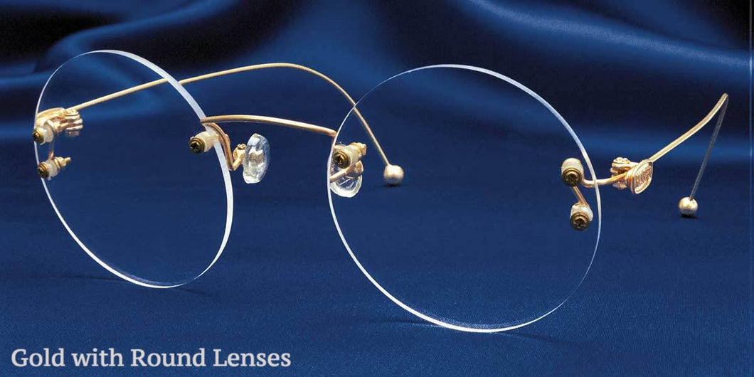 Side view of Signature Rimless gold eyeglasses with round lenses