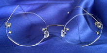 Load image into Gallery viewer, Front view of Signature Rimless silver eyeglasses with octagon lenses
