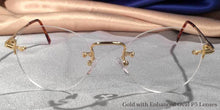 Load image into Gallery viewer, Front view of Traditionals Rimless gold metal eyeglasses with oval lenses
